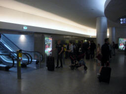 Ticket hall and escalators to departure island platform