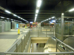 The bay platforms for trams terminating from the north can be seen ahead, and one of the through platforms below can also be seen