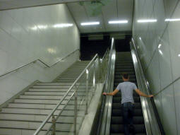 Looking up to the northbound island platform coming from the south- and eastbound platforms