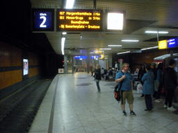 The island platform for stadtbahn trams, on the side for southbound (other side for northbound). Stairs down to the platforms for east- and westbound, as well as up to exit, can be seen at the end
