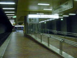 From the northbound platform the lift exit can be seen, as with all exits raised up to the height of a high platform to allow for easier conversion