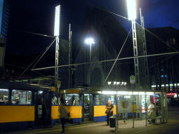 A tram stopped at the westbound platform
