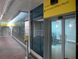 The escalators and lift up to the bus station from the main platform