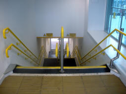 Looking down the stairs to the Metrolink platforms from the bus station