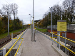 The island platform with the side for trams to Airport on the left