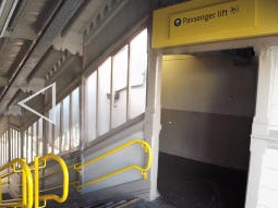 Auto-stitched photo of the stairs and access to the lift to the platform for trams to Manchester