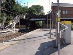 Panorama of the platform for trams to Altrincham and one end of the platform for trams to Manchester