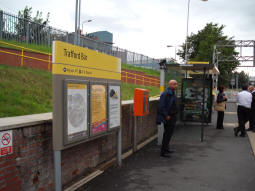 Looking in the direction of travel on the platform for trams to Altrincham and St Werburgh's Road