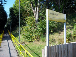 A style of sign normally only used on platforms indicates the way to trams to Bury from Middleton Road