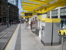 Looking along the platform for trams via Victoria
