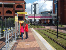 Looking along the platform for trams to Manchester, the platform for trams to Eccles and MediaCityUK can be seen in the distance