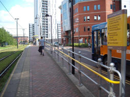 One of the entrances to the platform for trams to Eccles and MediaCityUK. The sign incorrectly says this is across the tracks