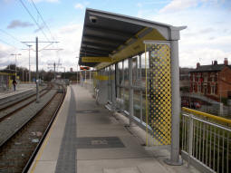 Looking along the platform for trams to Manchester