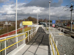 Looking towards the exit to Tweedale Way from the platform for trams to Rochdale