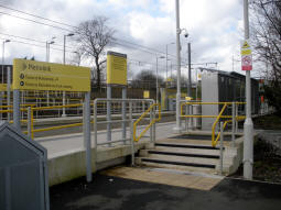 Stairs entrance to the platform for trams to Manchester from the car park