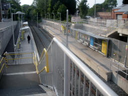 Looking down to the platforms from the top of the stairs down to the platform for trams to Manchester