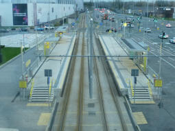 The station viewed from a Trafford Centre link bridge. The platform on the left is for trams to Manchester