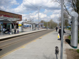 Looking across to the island platform (trams to Clifton South side nearest) from by a ticket machine on the pavement