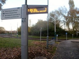 The display telling you which platform to go to for the next tram to the city centre, now with added indicators of which way you need to go for each of A and B