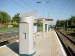 Looking along the platform for trams to Hucknall with the double-sided ticket machine unit in view
