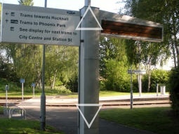At the split for the two island platforms is this display, which shows a little arrow indicating which one to go to for the next tram to Station Street