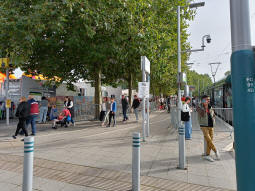 Looking along the platform for trams to the city centre, with some added temporary barriers due to a major fair taking place on the recreation ground and car park to the left