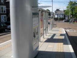 The platform for trams to Hucknall and Phoenix Park showing the double-sided ticket machine unit