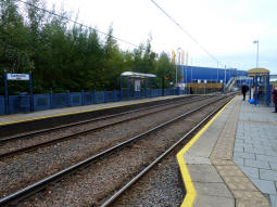 The platforms from by the one for trams to Middlewood or Cathedral. The new Ikea store, whose logo now adorns the stop name signs, can be seen in the background