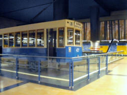 An old tram on display in the station concourse