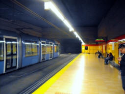 The in-use platform at this terminus, with a tram sat at the out-of-use platform