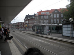 Three of the platforms: The tram is at the platform for trams to Charlois, the platform in the middle of the image is for south-westbound trams coming from the north, and the nearest platform is for northbound trams